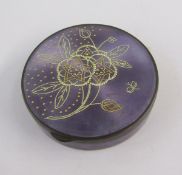 Guilloche enamel, silver and silver-gilt circular compact, decorated with purple enamel and inlaid