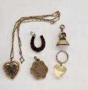 Gold-coloured metal and garnet horseshoe-shaped pendant, a 9ct gold chain, plated locket set with