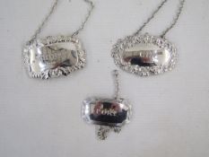 Three 20th century silver decanter labels, named for Whisky, Gin and Port, with various hallmarks,