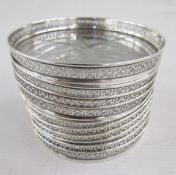 Set of ten 20th century American sterling silver and glass mounted coasters, each with pierced
