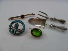 Gold-coloured bar brooch set single faceted red stone, a green stone small brooch, a silver and
