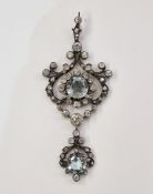 Victorian aquamarine and diamond pendant, cushion shaped aquamarine and diamonds in openwork foliate