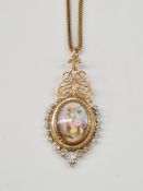 Gold coloured metal painted porcelain and seedpearl locket pendant, having scroll hinged terminal,