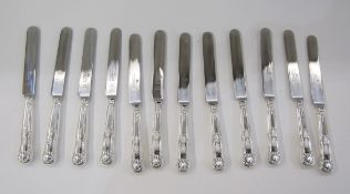 Set of eight silver-handled table knives, queens pattern, marks rubbed, the blades stamped 'Harrison