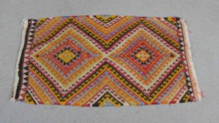 A hand woven Afghan Kelim. L.105 W.66cm.