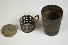 A German repoussé swag design silver cup by C.E.Geyser along with a silver and enamel circular
