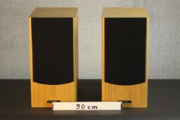 A pair of PMC (Professional Monitor Company Limited) oak stereo speakers, serial number 006164. H.40