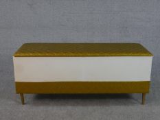 A late 20th century white painted blanket box, of rectangular form, the lid and lower sides
