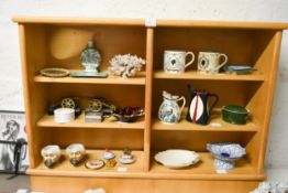 A shelf of collectible items.