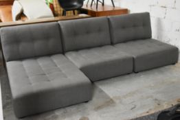 A contemporary Habitat three section sofa in buttoned upholstery. L.275 x D.150 x H.80cm