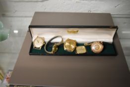 A 9ct Gold Ladies Fob watch (A/F) plus three other watches.