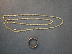 A red metal (tests as 9 carat) D-shaped wedding band along with an 8 carat yellow gold twist curb