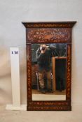 A 19th century Dutch marquetry inlaid pier mirror, the frieze depicting a basket of flowers, over