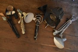 A vintage Mole Richardson theatre spotlight along with three anglepoise bench lamps and a similar