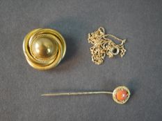 A collection of gold and yellow metal jewellery, including a 18 carat yellow gold plated brooch