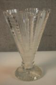 A large crenelated conical crystal vase on star cut pedestal base. H.32 Dia.20cm.