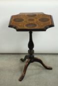 A 20th century George III style ebonised occasional table, the square top with canted corners