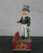 A 19th century style painted cast iron mechanical 