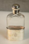 A Victorian Mappin & Webb silver and cut glass hip flask and cup. The cup with gilded interior,