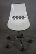 A contemporary Connubia JAM office desk chair, the two-tone technopolymer shell in hues of white and