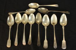 A collection of eleven silver serving spoons, including a pair of Georgian serving spoons (HB for