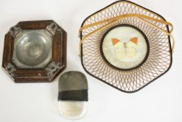 A pewter and leather hip flask along with a treen oak and pewter 19th century ash tray and a