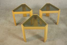A set of three Porada Arredi Italian light oak occasional tables, circa 1970s, of wedge form with