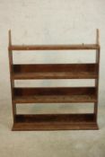 A Victorian painted pine faux grain wall hanging bookshelf. H.109 W.92 D.20cm.