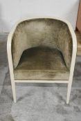 A tub armchair with painted frame in velour upholstery. H.80 x W.59 x D.55cm