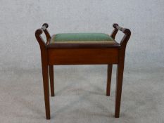 A Victorian mahogany framed piano stool raised on square tapering supports, H.56 W.53 D.35cm