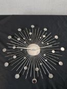A mid 20th century style polished metal sun or sputnik style wall clock. H.50 W.50 D.1cm