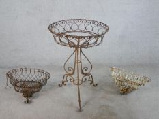 Three assorted 20th century painted garden planters comprising two wall hanging baskets and a