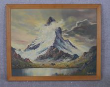 Yautauch (20th century); Snow covered mountain with lake, oil on canvas, signed in a beech frame. H.