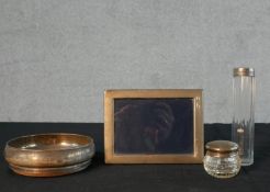 An assortment of hallmarked silver to include an Elizabeth II silver mounted photograph frame,
