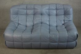 A late 20th century Togo blue leather two seater sofa designed by Michael Ducorary for Ligne
