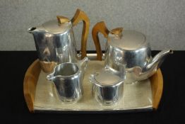 A mid 20th century five piece Picquot ware. coffee and teaset, complete with tray. H.4 W.39 D.