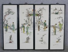 A set of four 20th century framed Chinese wall hanging panels, when put together forms a picture