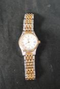 A 20th century Omega ladies bi-metal ladies wristwatch, with baton numerals and date aperture. W2.