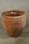 A large contemporary glazed terracotta garden pot. H.61 Dia.64cm.