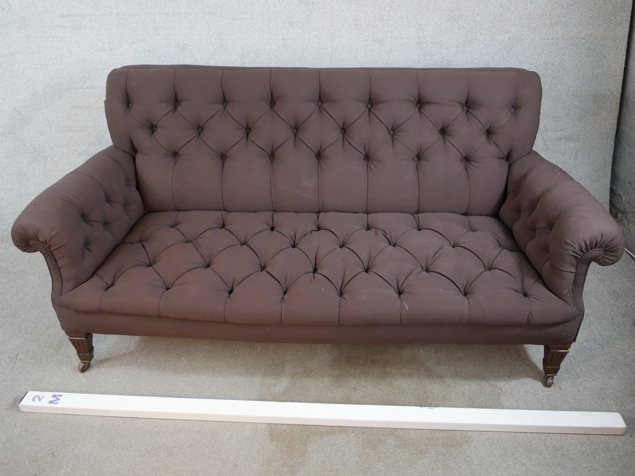 A late 19th century mahogany framed button upholstered scroll arm settee, raised on square - Image 5 of 5