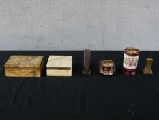 Four assorted cigarette lighters to include a silver plated engine turned Dunhill Tallboy lighter, a
