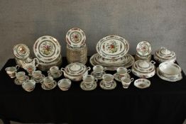 An early 20th century Paragon 'Tree of Kashmir' extensive part dinner service, comprising of plates,