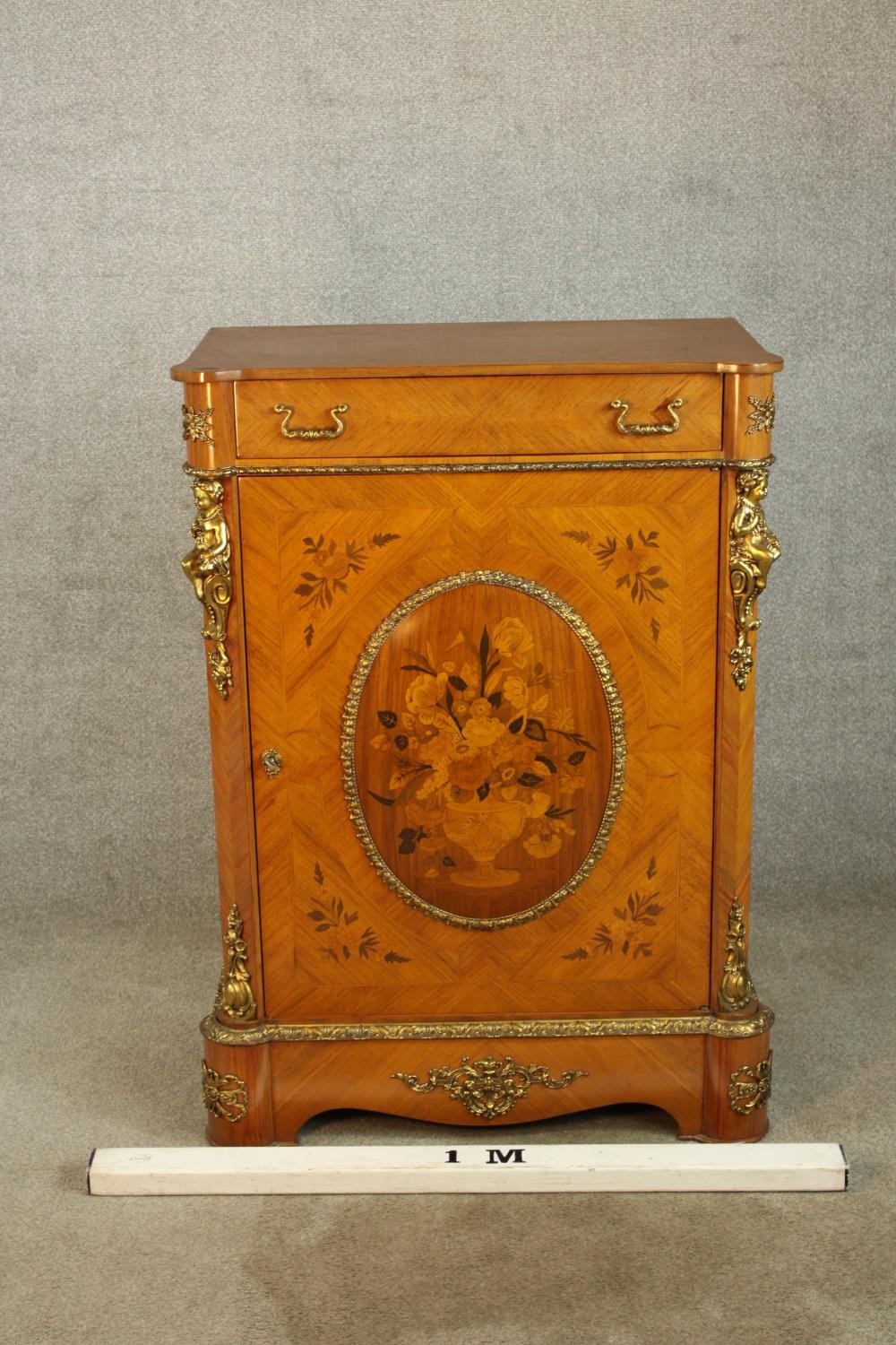An 20th century French inlaid single door cabinet raised on shaped bracket feet, applied - Image 2 of 9