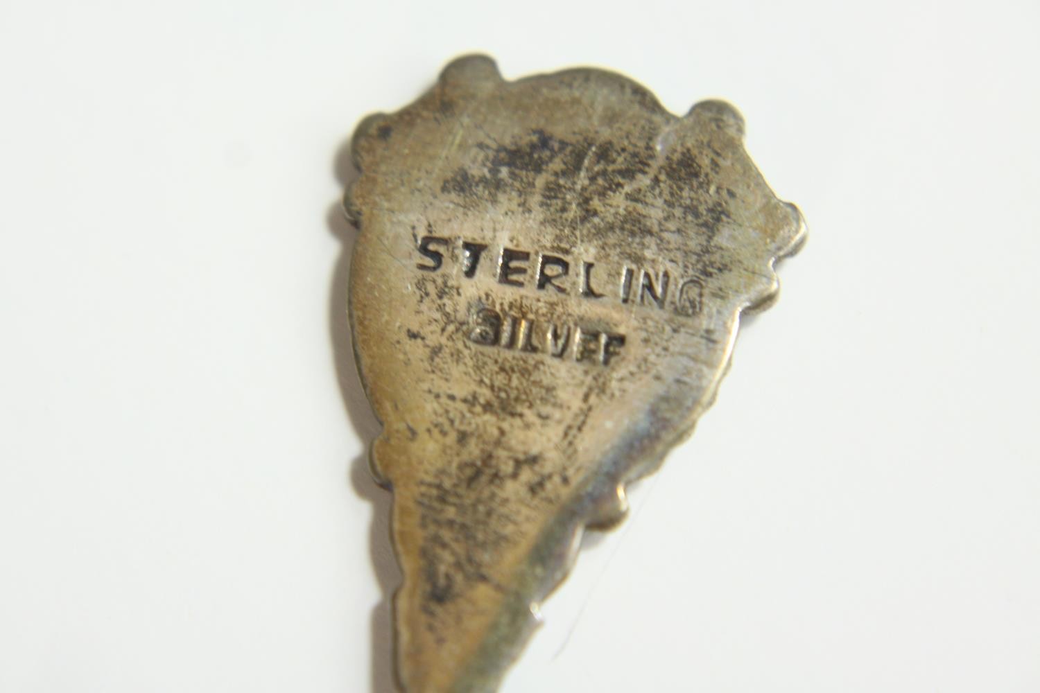 Two 20th century gilt and enamel egg ornaments, together with a small glass globular scent bottle - Image 10 of 10