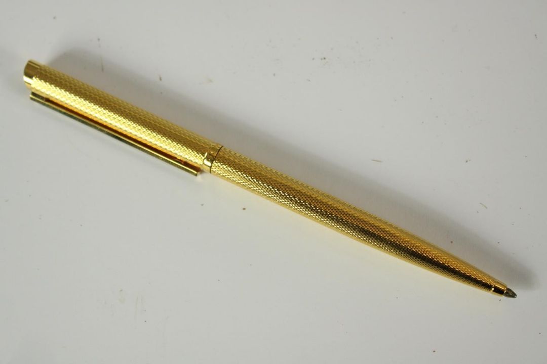 A mid 20th century boxed gold plated Dunhill rollerball pen. H.6 W.17.5 D.4cm. (box) - Image 5 of 10