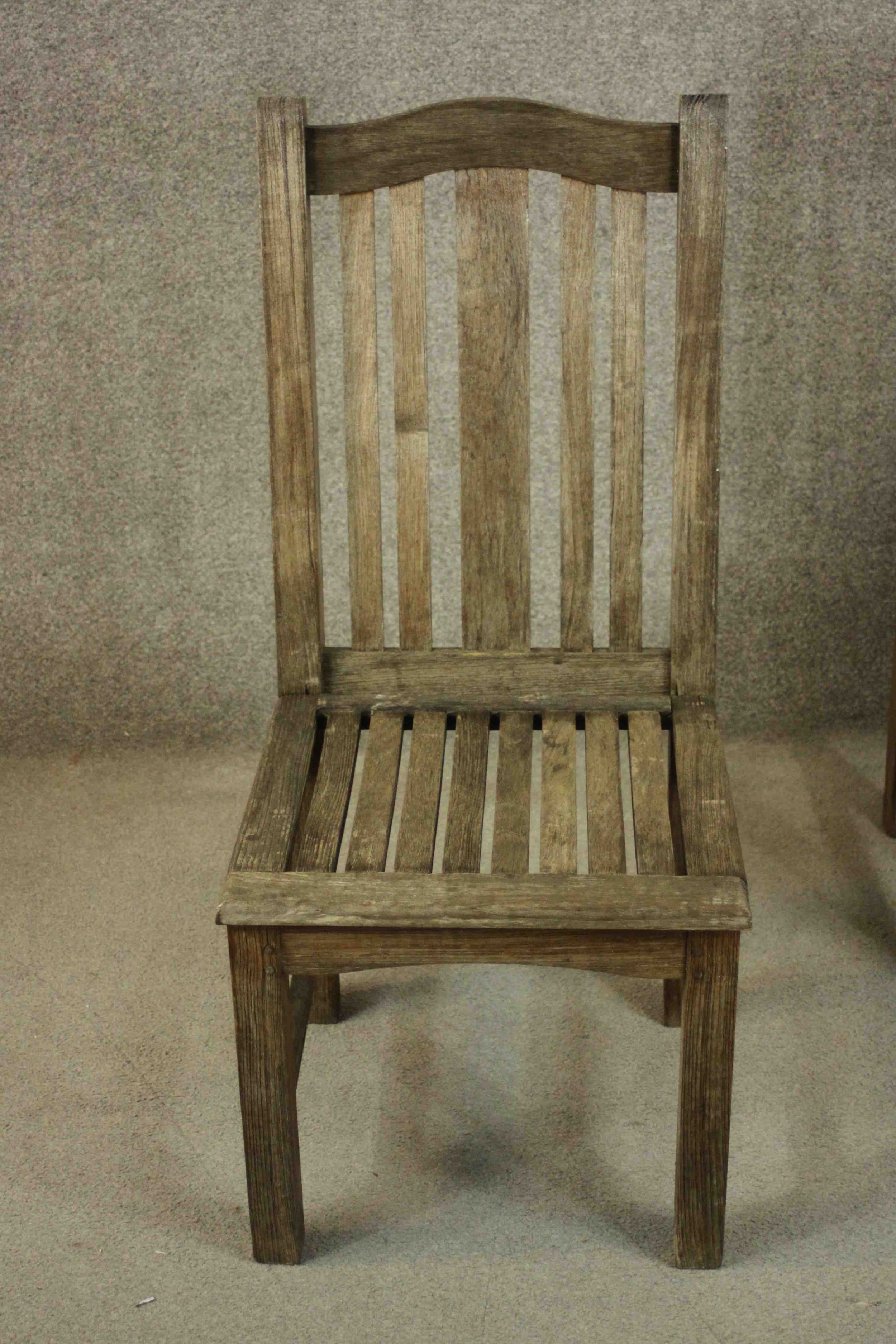 A set of four contemporary Barlow and Tyrie oak garden dining chairs, with slatted seats. - Image 4 of 9