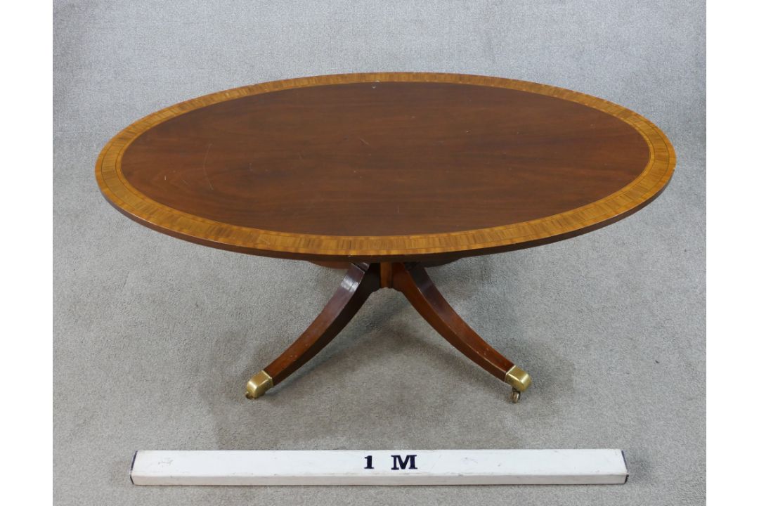 A Regency style inlaid mahogany oval coffee table raised on turned central column on four outswept - Image 4 of 6