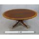 A Regency style inlaid mahogany oval coffee table raised on turned central column on four outswept - Image 4 of 6
