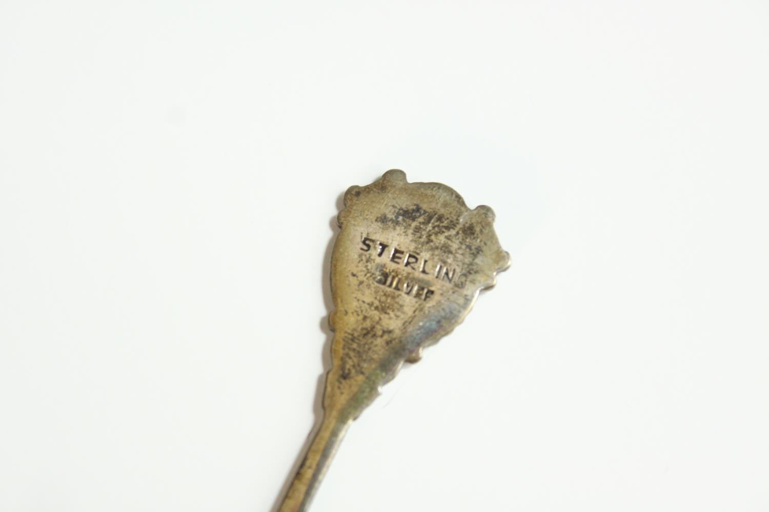 Two 20th century gilt and enamel egg ornaments, together with a small glass globular scent bottle - Image 9 of 10