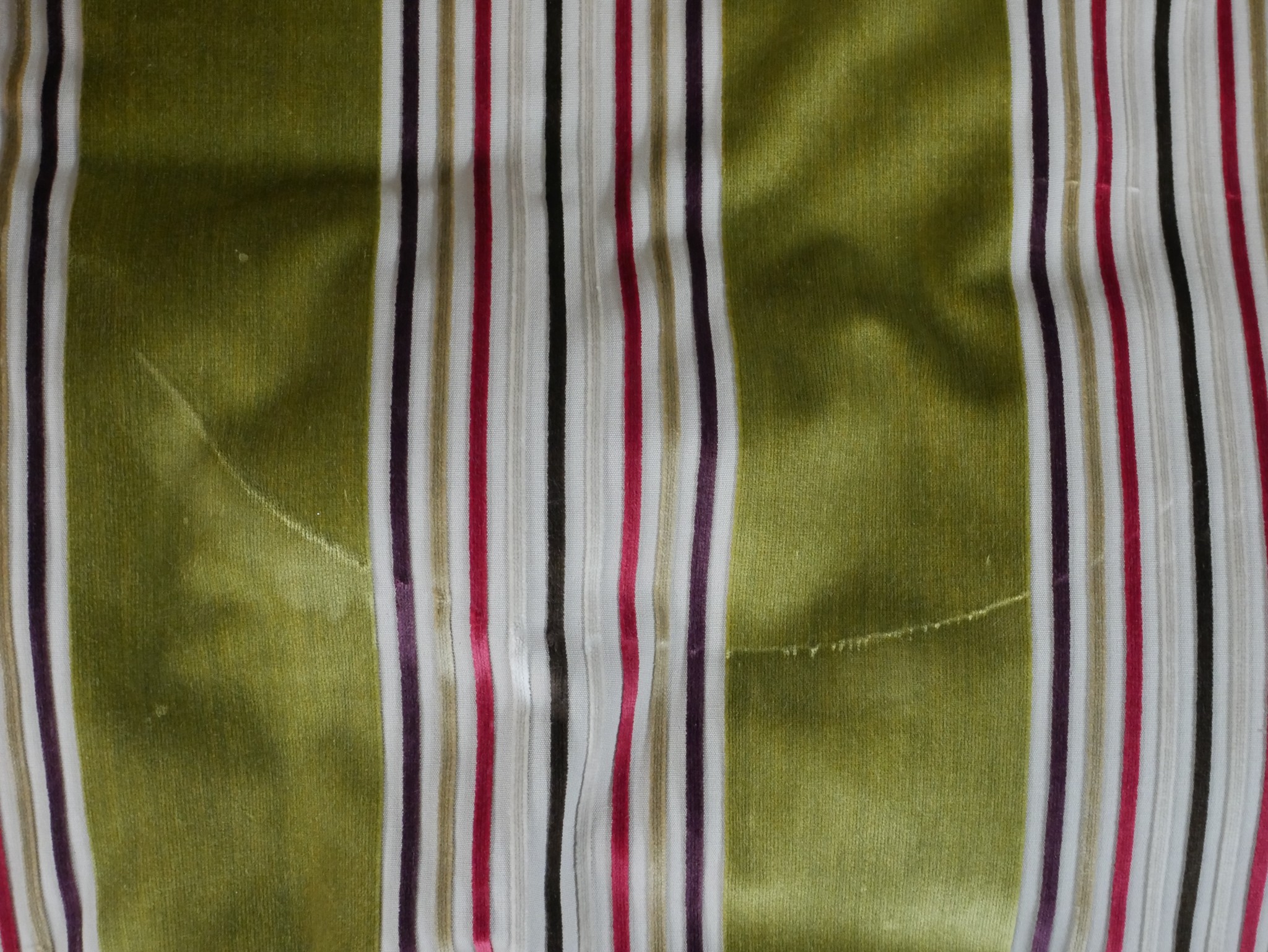 A late 19th/early 20th century walnut and bergère framed French style armchair raised on fluted - Image 3 of 5